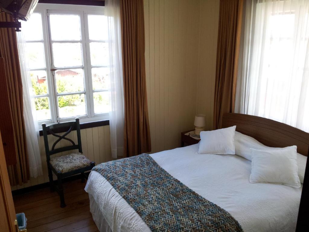 Hostal Opapa Juan Puerto Varas Habitación foto